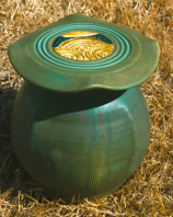 New Lidded Pot on straw grass